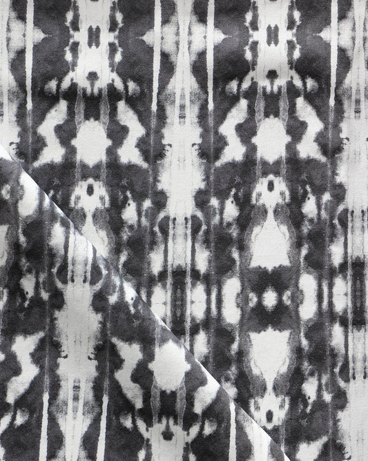 A close up of Biami Fabric Black, a high-end black and white tie dye fabric