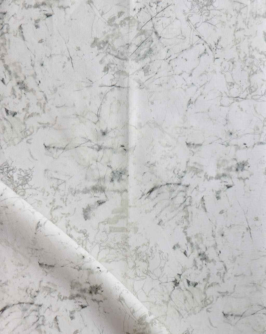 A close up image of a Bosky Toile Fabric Bare with a watercolor-like pattern