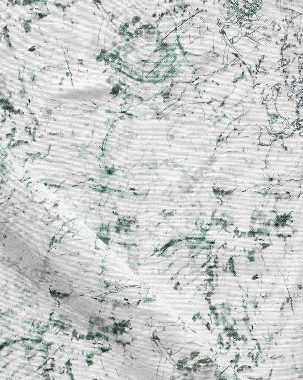 A white and green Bosky Toile Fabric Chloros pattern on a luxury fabric