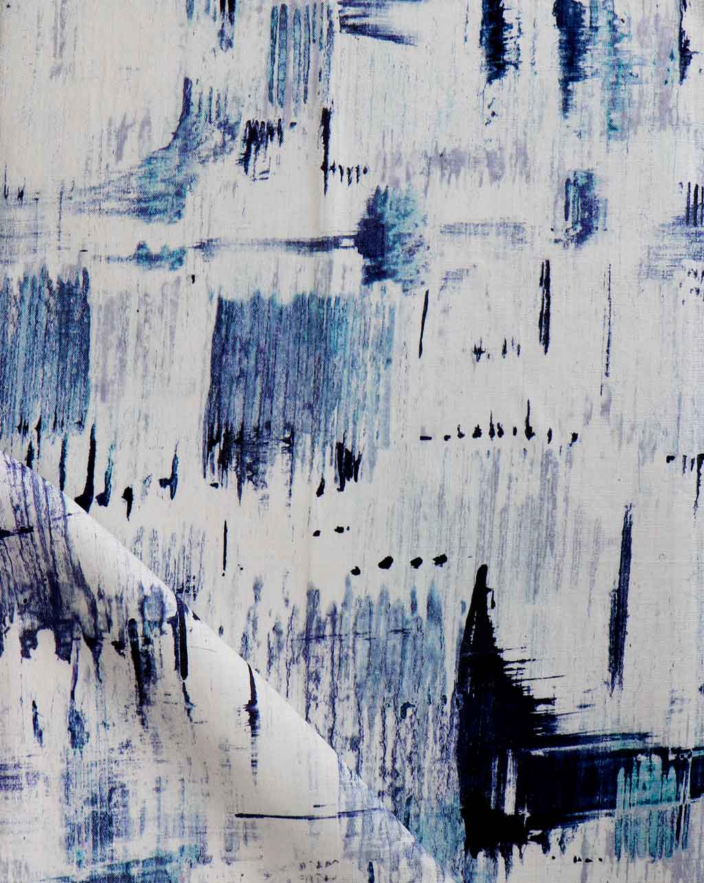 A close up of a blue and white painting on Cherifia Fabric, featuring the Cherifia pattern