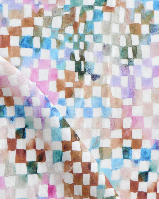 A close up of Chess Fabric Multi, a colorful checkered pattern