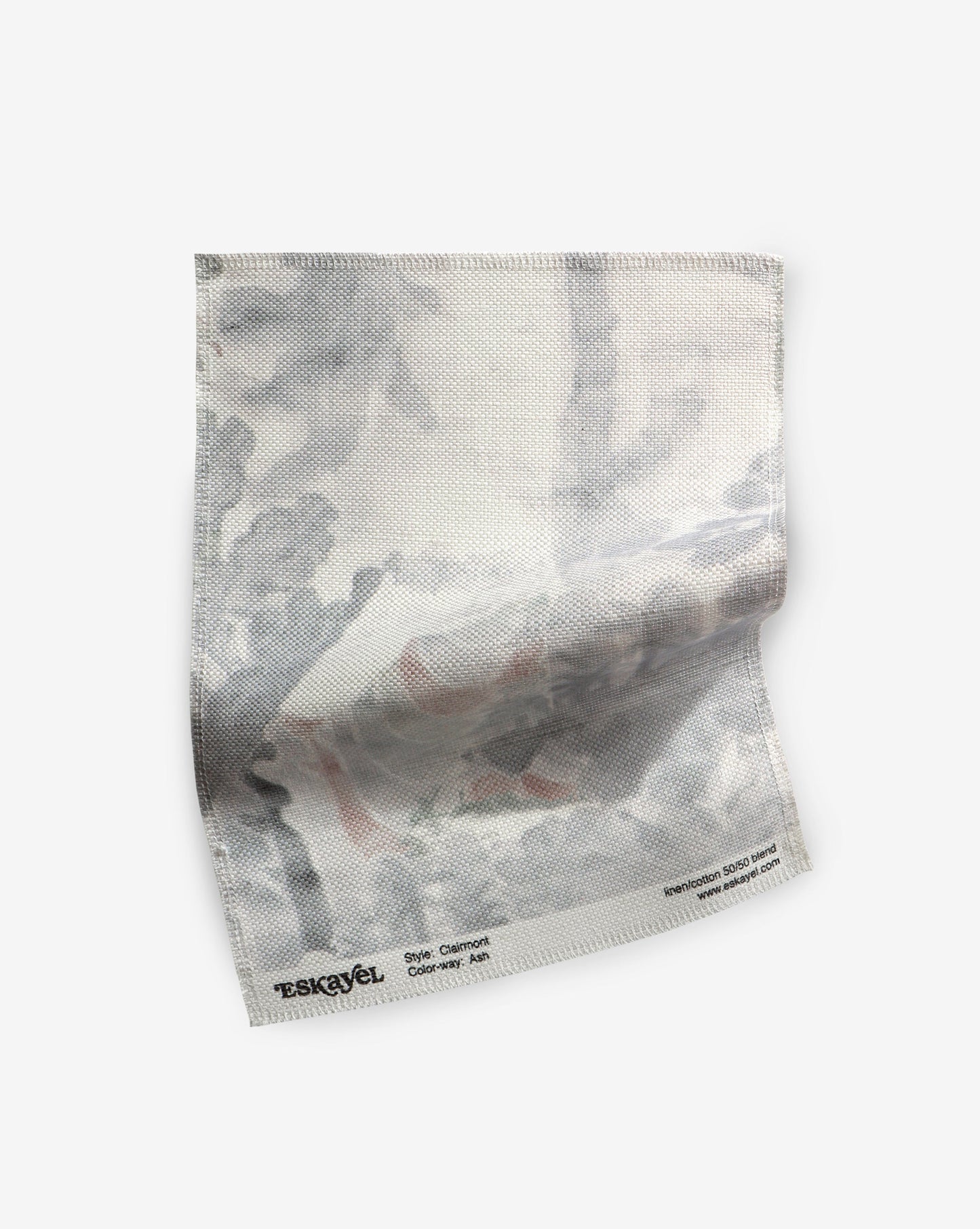 A Clairmont Fabric Sample Ash napkin with a red and white pattern on it