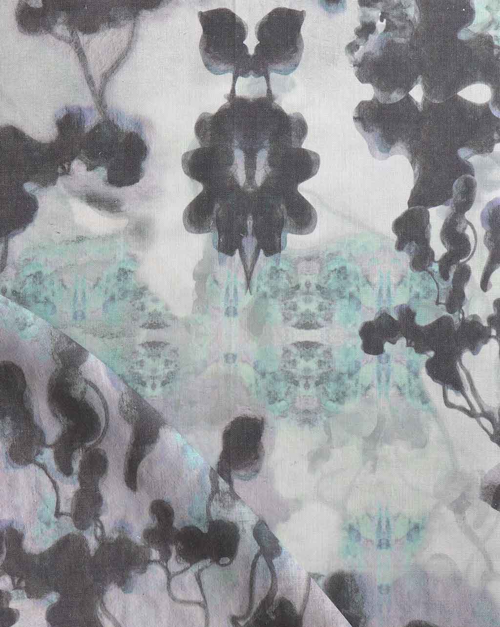 A close up of Clemente Fabric from the Presidio Collection, with a luxury black and white pattern