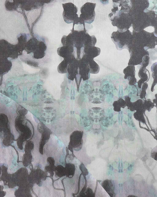 A close up of Clemente Fabric from the Presidio Collection, with a luxury black and white pattern