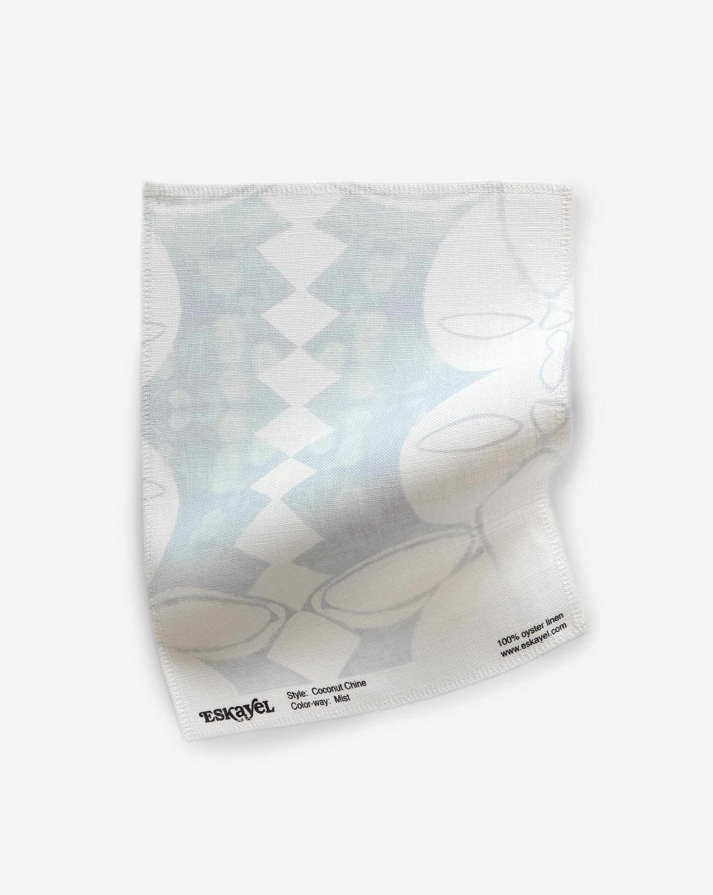 A Coconut Chine Fabric Mist with a blue and white pattern on it