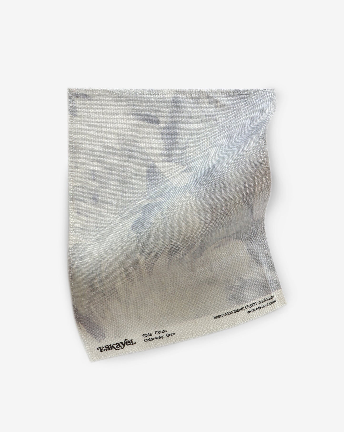 A piece of Cocos Fabric Bare with a blue and white pattern featuring Cocos and palm tree motifs