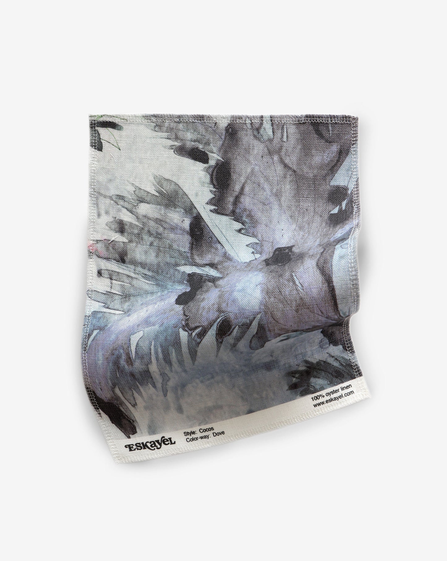 A Cocos Fabric Sample Dove with a painting on it