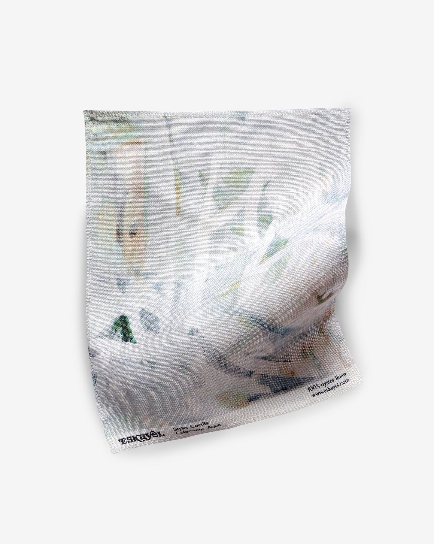 A piece of fabric with a painting on it can be customized to create unique Cortile Fabric Aqua pillows or rugs