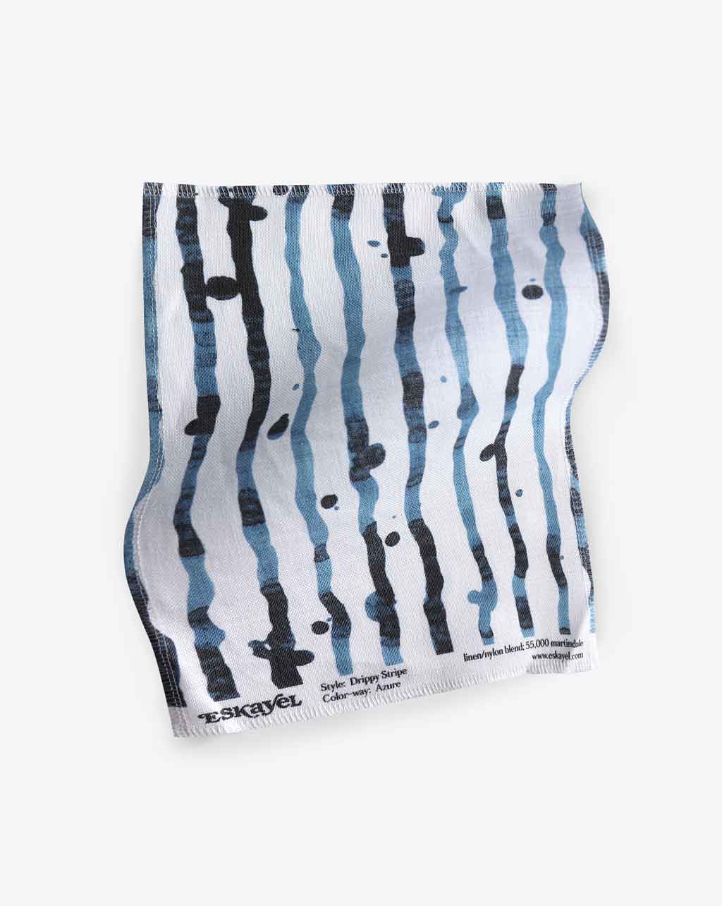 A Drippy Stripe Fabric Azure custom fabric with blue and black stripes on it