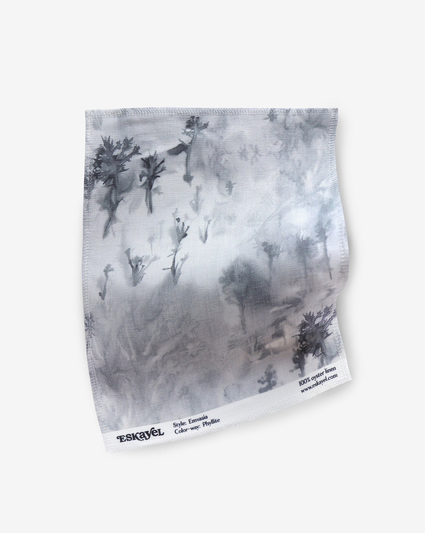 A piece of Phyllite fabric with a black and white painting on it