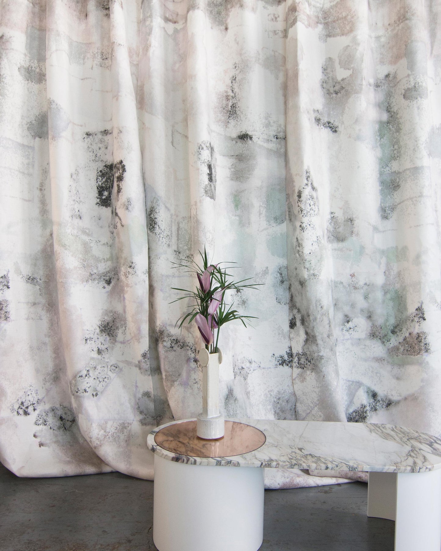 A table with a Kotoubia Fabric Duomo in front of it, inspired by the beautiful landscapes of Morocco and the majestic High Atlas mountains