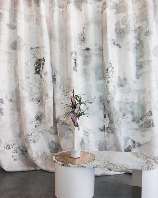A table with a Kotoubia Fabric Duomo in front of it, inspired by the beautiful landscapes of Morocco and the majestic High Atlas mountains