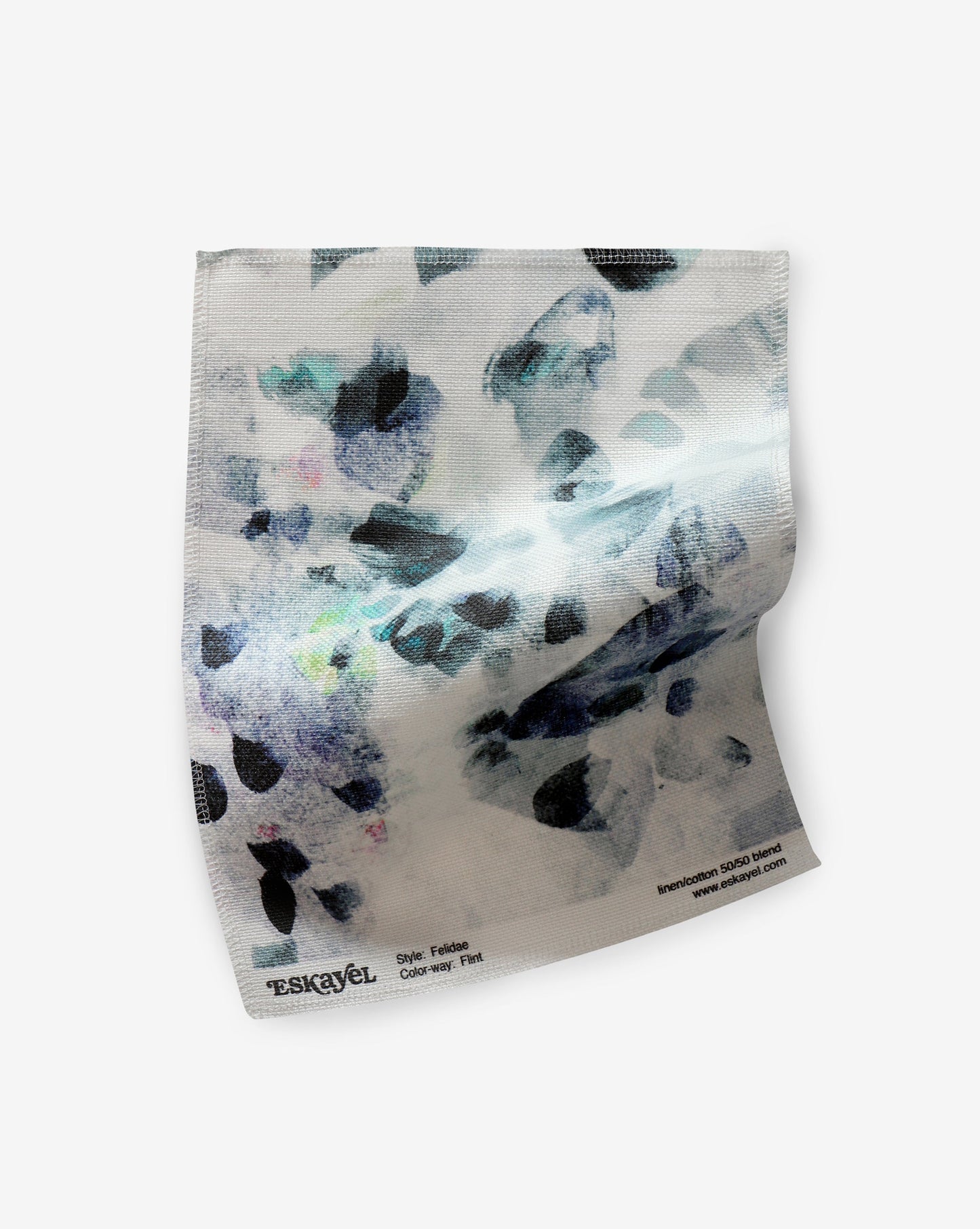 A Felidae Fabric Flint with a black and white design