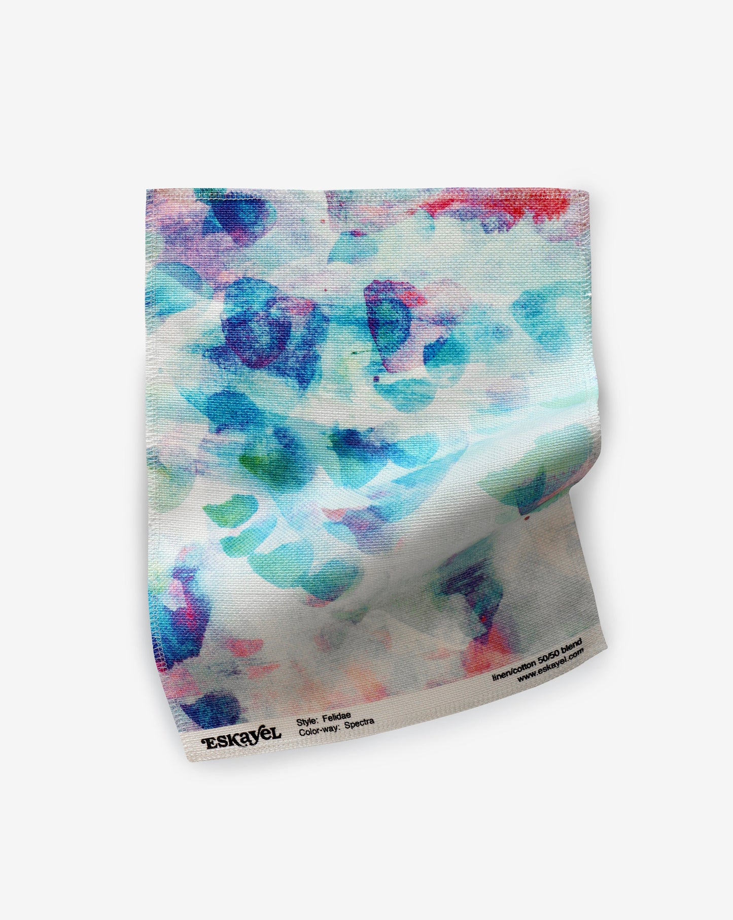 A colorful Felidae Fabric Sample on a piece of fabric