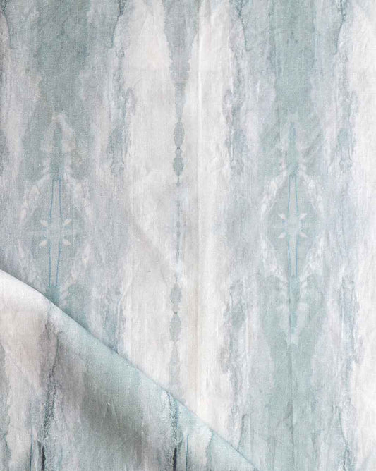 A close-up of a blue and white Feudal Facet Fabric Light Slate