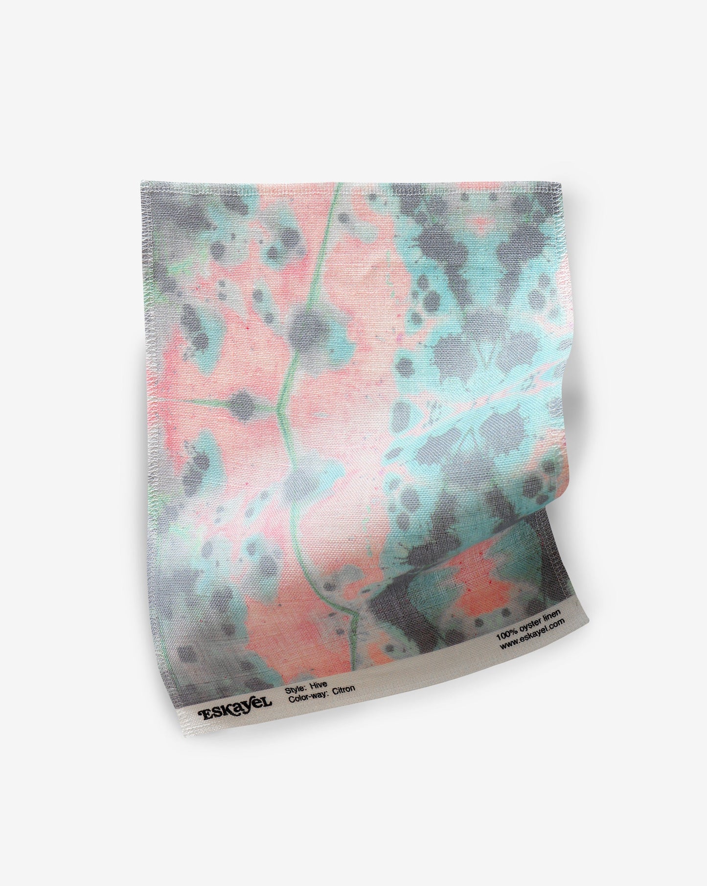 A Hive Fabric Sample Citron with a tie dye pattern on it