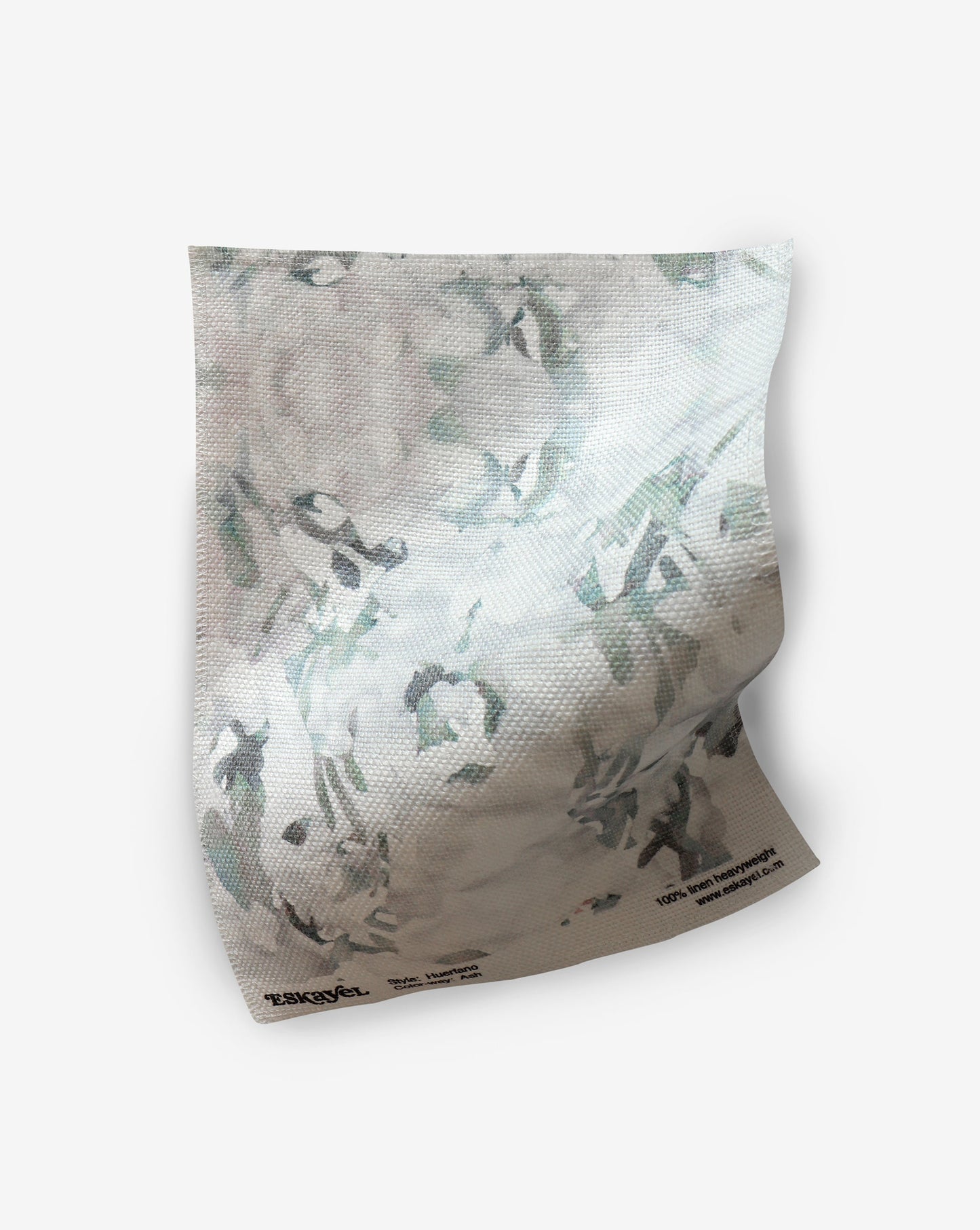 A of Huerfano Fabric Sample Ash with an image of a flower on it