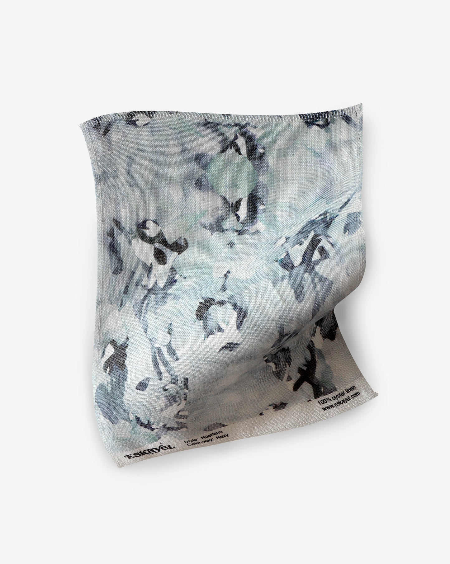 A fabric with a blue and white pattern in the Huerfano Fabric Navy colorway