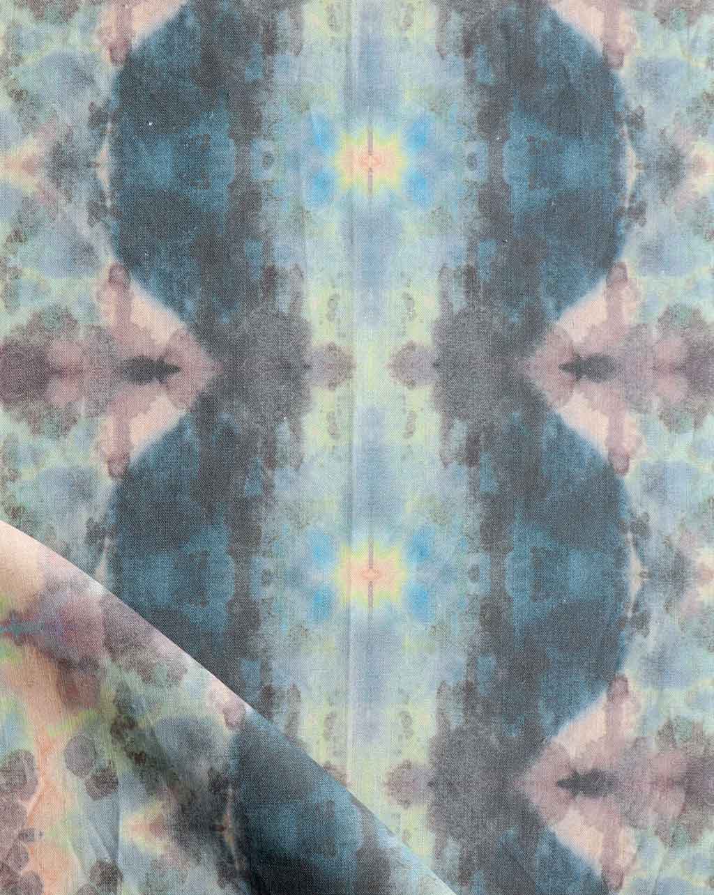 A Jangala Fabric Citron with a tie dye pattern