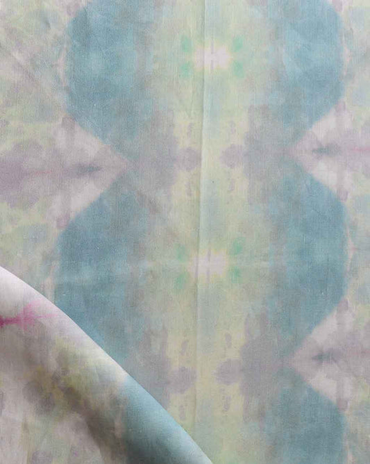 A piece of Jangala Fabric with a tie dye pattern