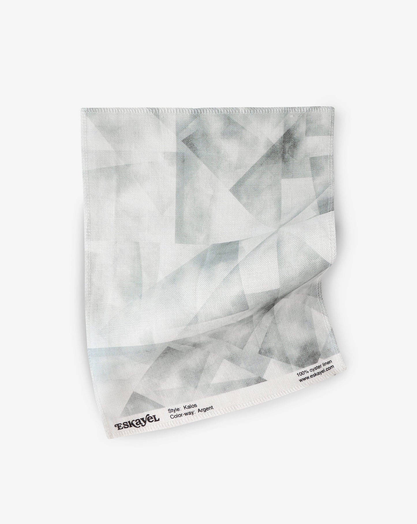 A napkin with the Kalos Fabric Argent pattern on it