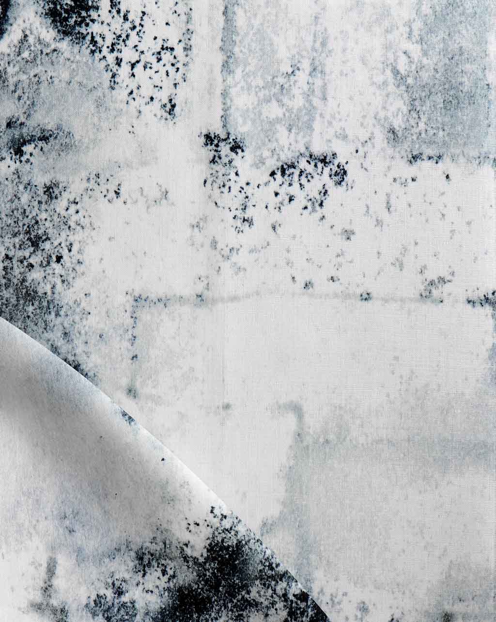 A close up of a Kotoubia Fabric Cyrrus painting on a wall in Morocco