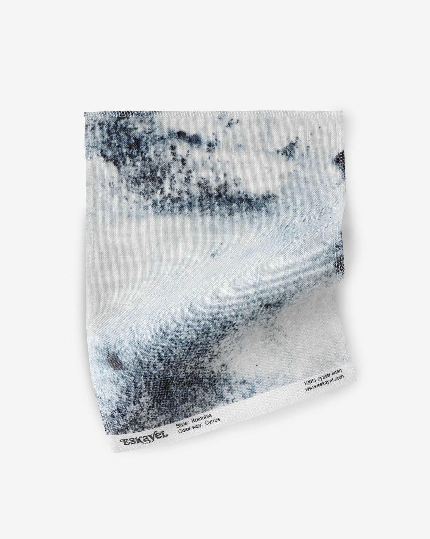 A sample with a Kotoubia Fabric Sample Cyrrus design on it