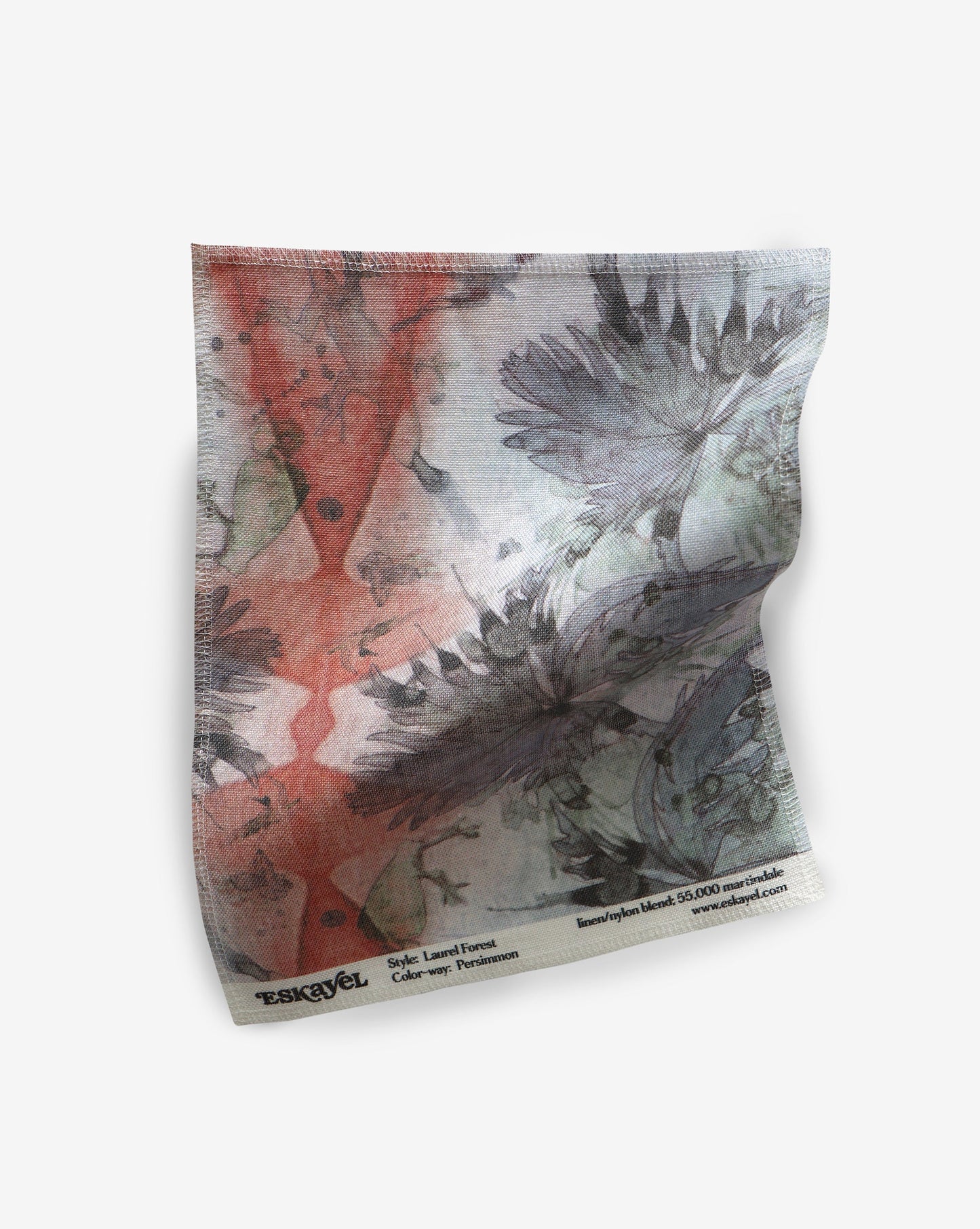 A piece of Laurel Forest Fabric Persimmon with an image of a tropical flower on it