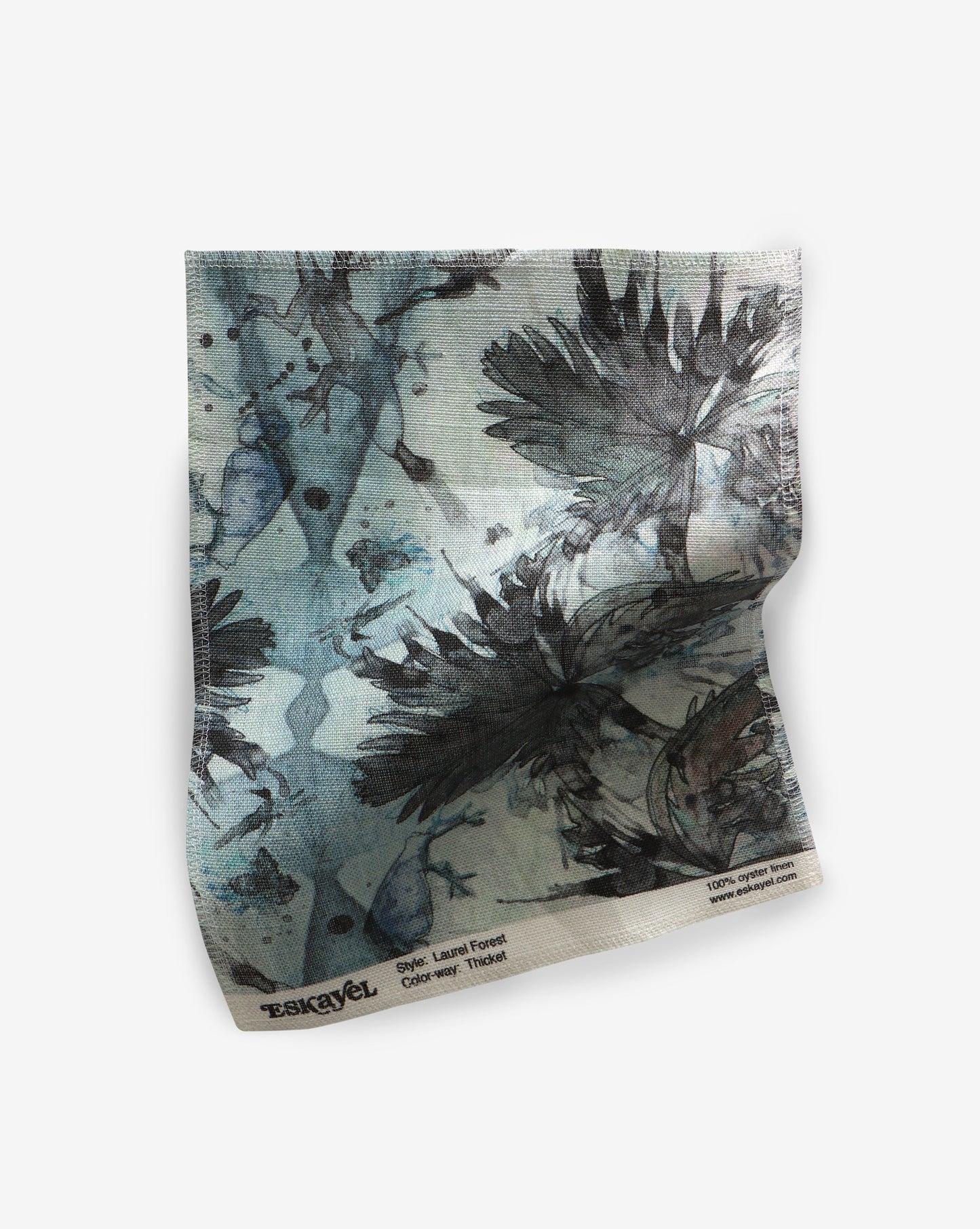 A Laurel Forest Fabric Sample fabric with a blue and black pattern on it