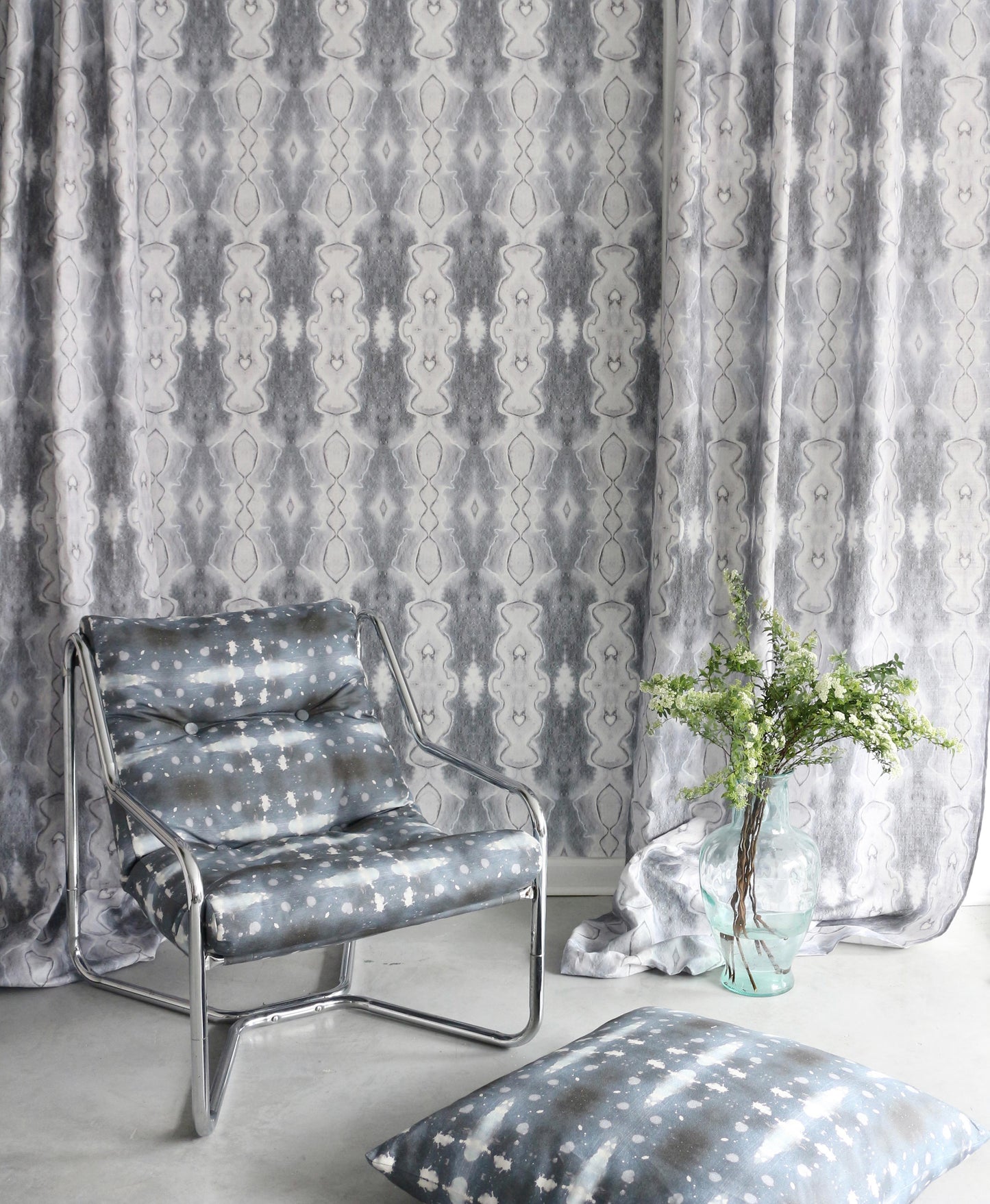 A Polaris Fabric Nila chair in front of a window