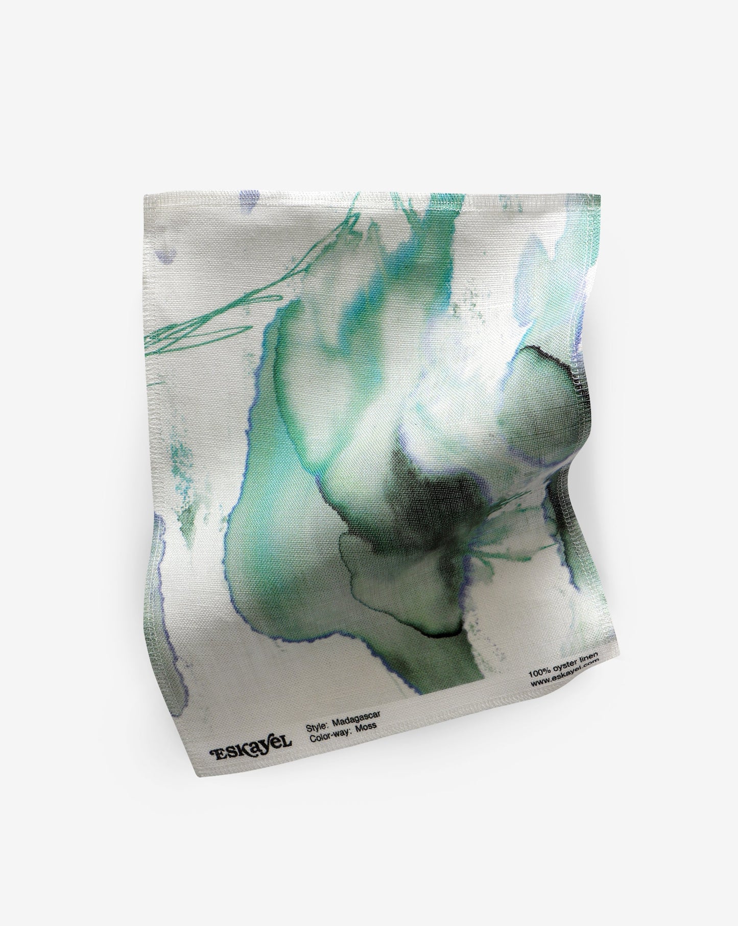 A tote bag with a green and white Madagascar Fabric Moss painting on luxury fabric