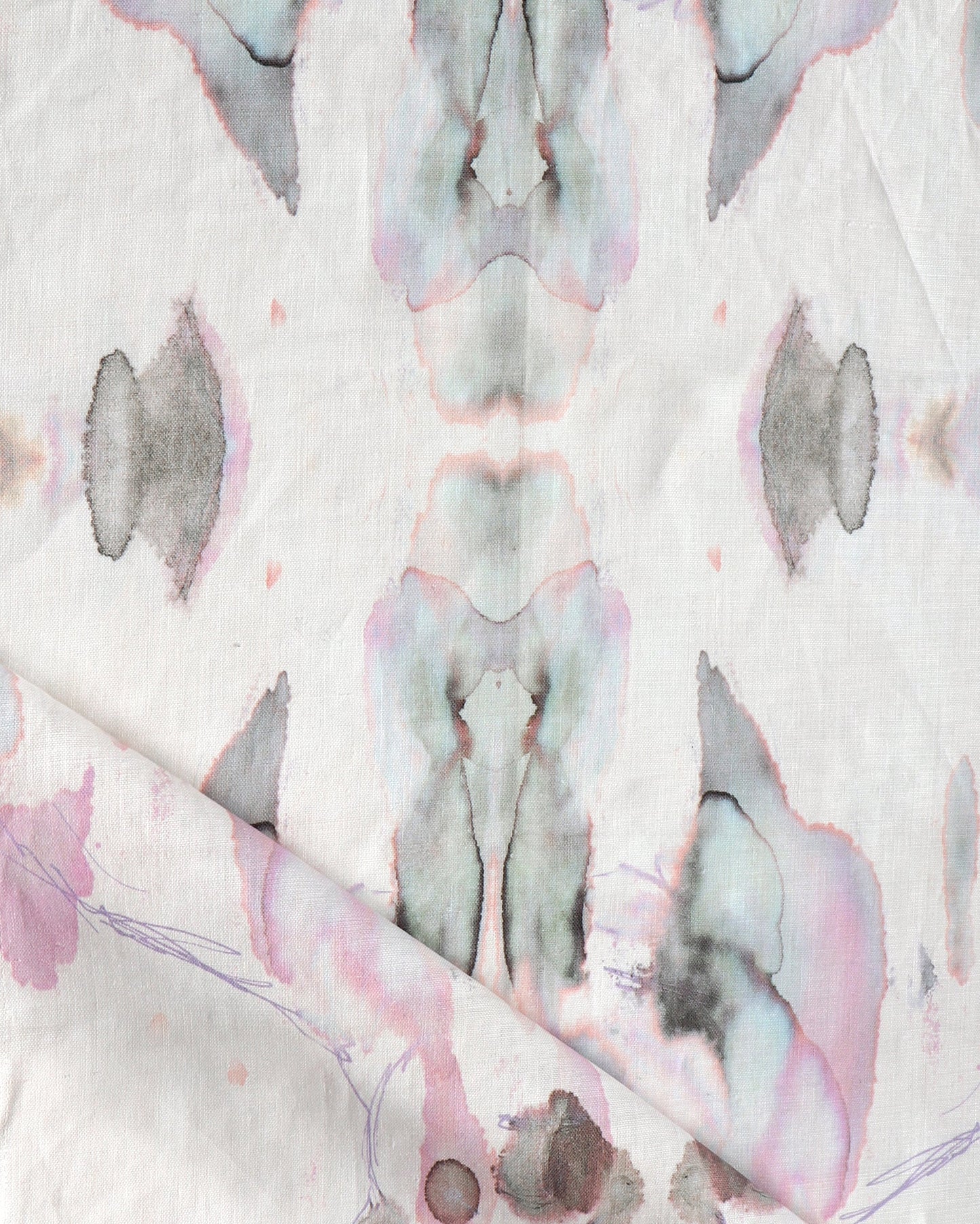 A Madagascar Fabric Rose with a pink and blue pattern on it, inspired by Eskayel's high-end design from Madagascar