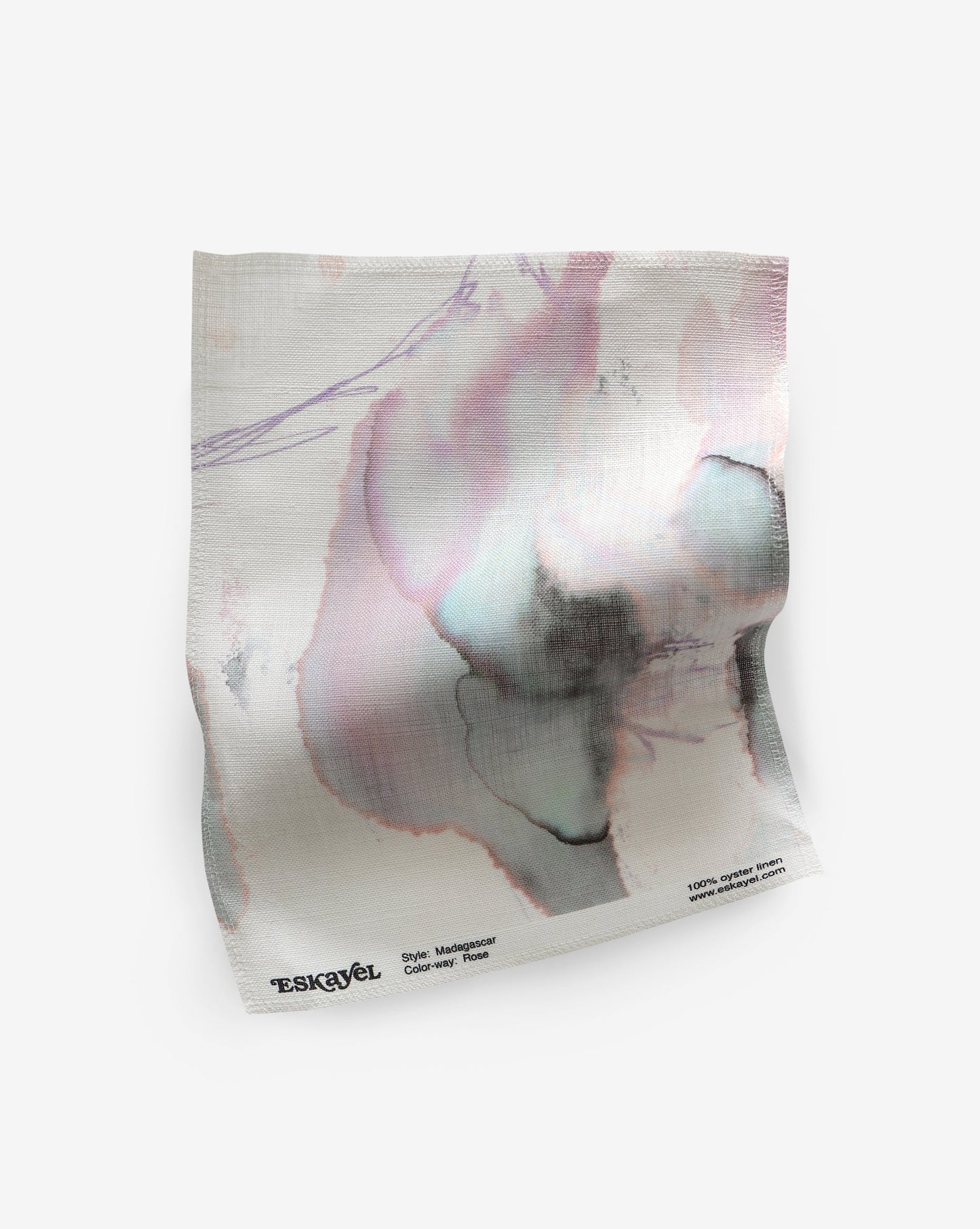 a Madagascar Fabric Sample Rose with a pink and white design on it