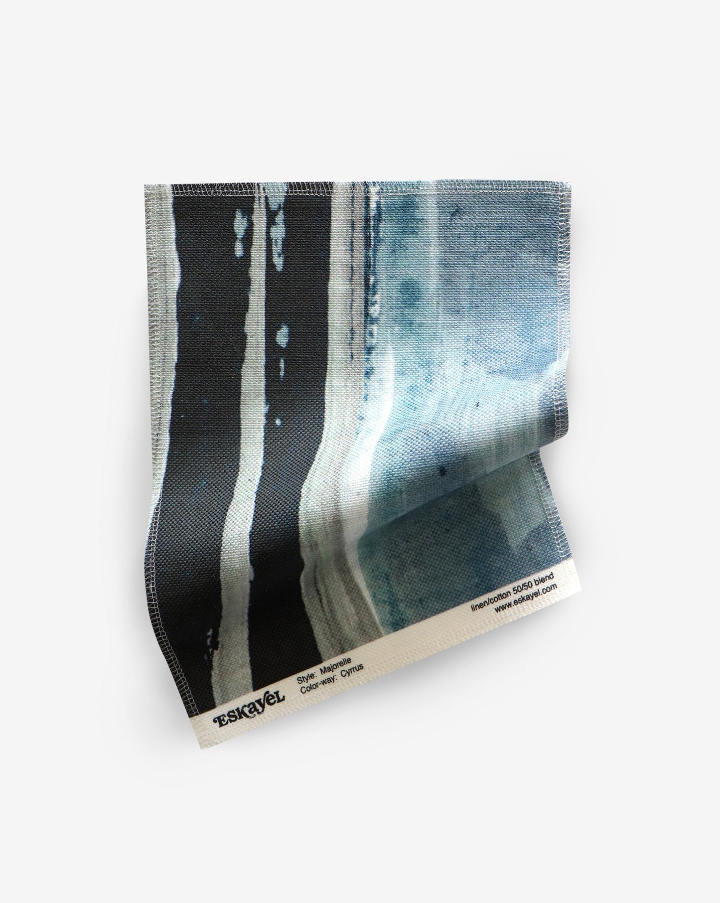 A Majorelle Fabric Sample with a blue and black pattern on it