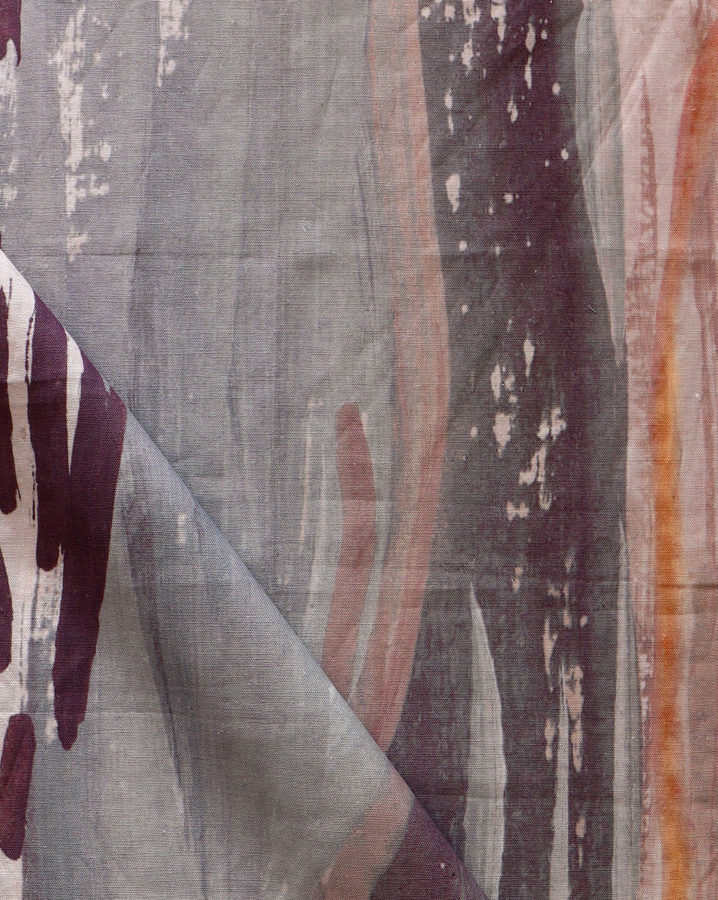 A close up of a piece of Majorelle Fabric with paint on it