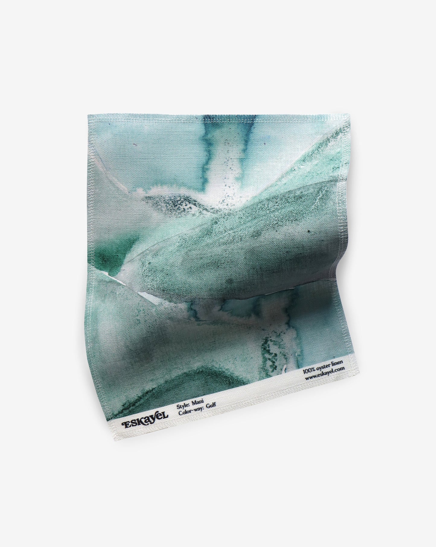 A colorful design featuring the Mani Fabric Gulf colorway on paper