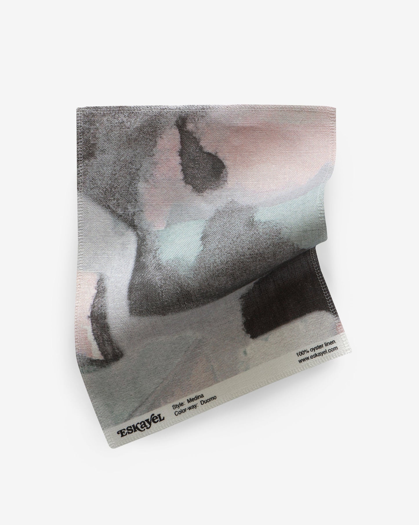 A pink, grey, and black pattern on a Medina Fabric inspired by the vibrant Marrakesh roofs