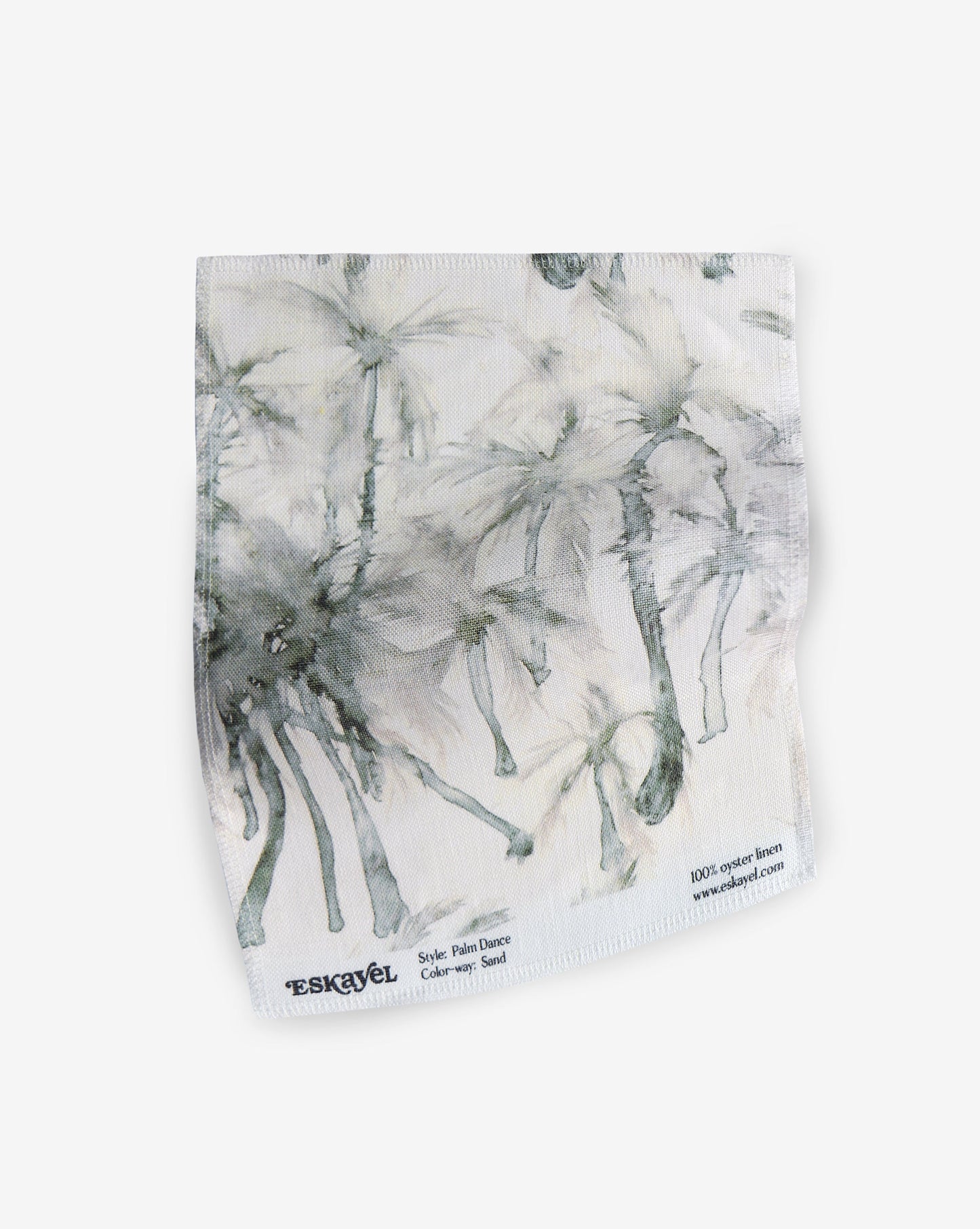 A white and gray fabric with a luxurious watercolor pattern of Palm Dance Fabric Sand