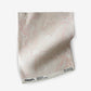 A Pecosa Fabric Light Peach fabric made of fabric on a white surface