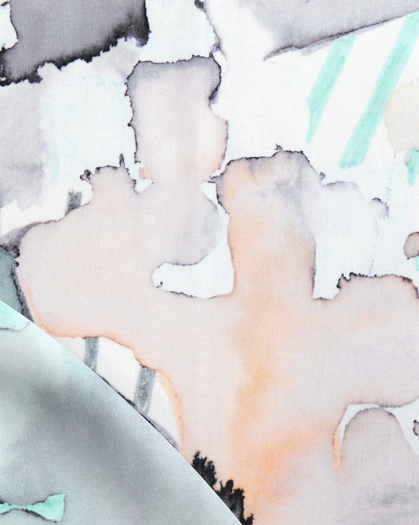 A close up of a Sea Galaxy Fabric Reef painting on a piece of fabric