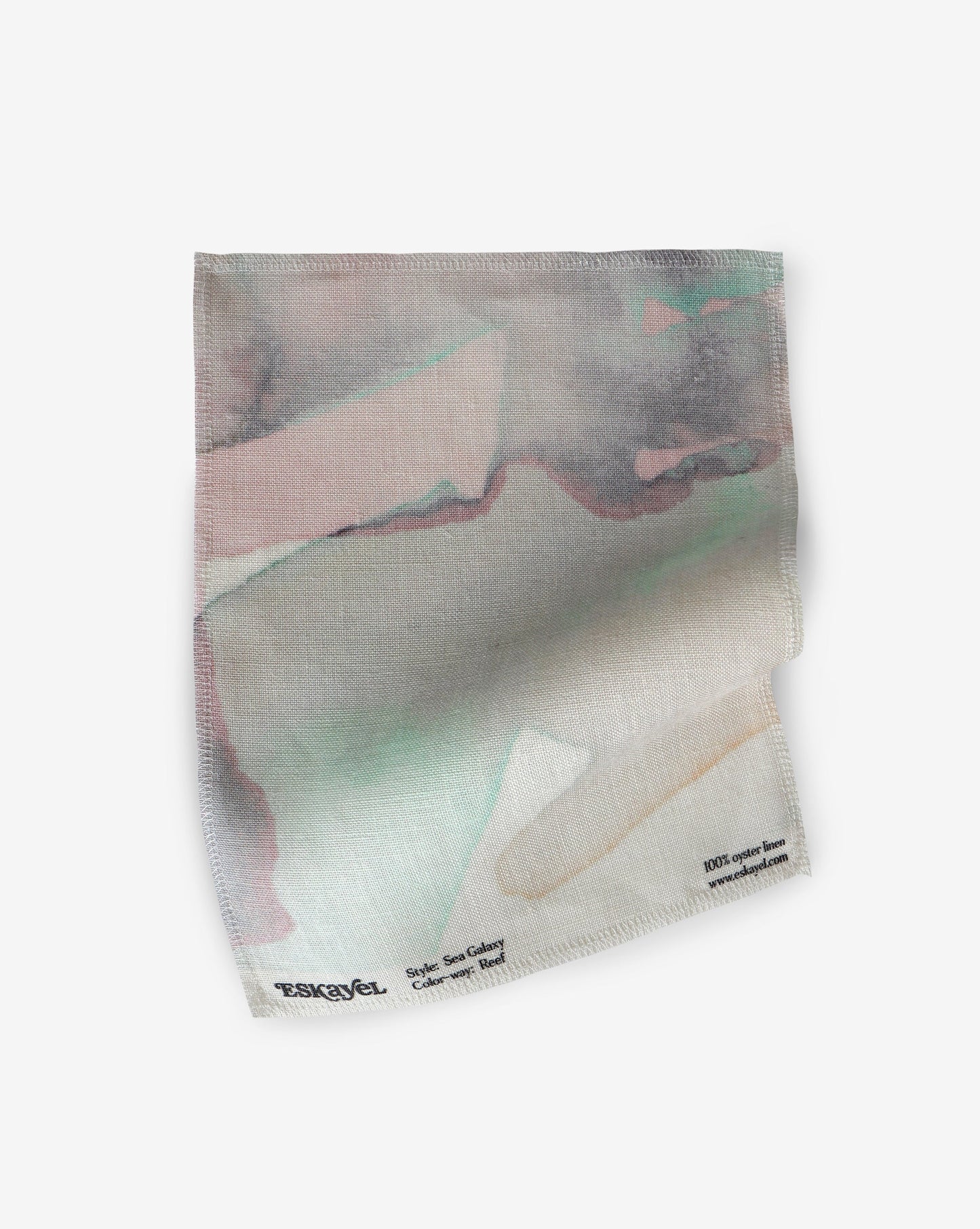 A hand fabric with the Sea Galaxy Fabric Reef on it