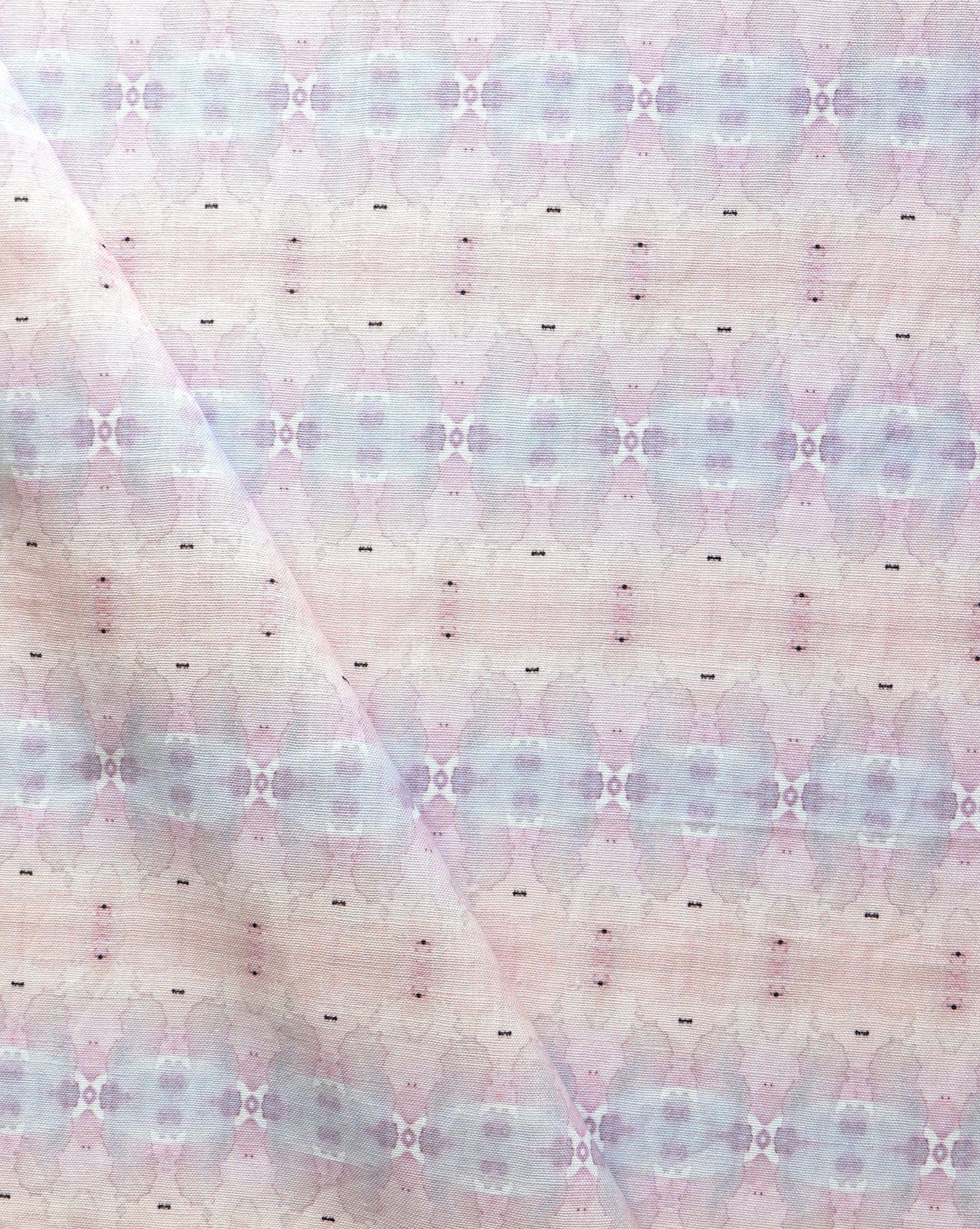 A close up of the Setting Sun Fabric Light Raspberry with an abstract design