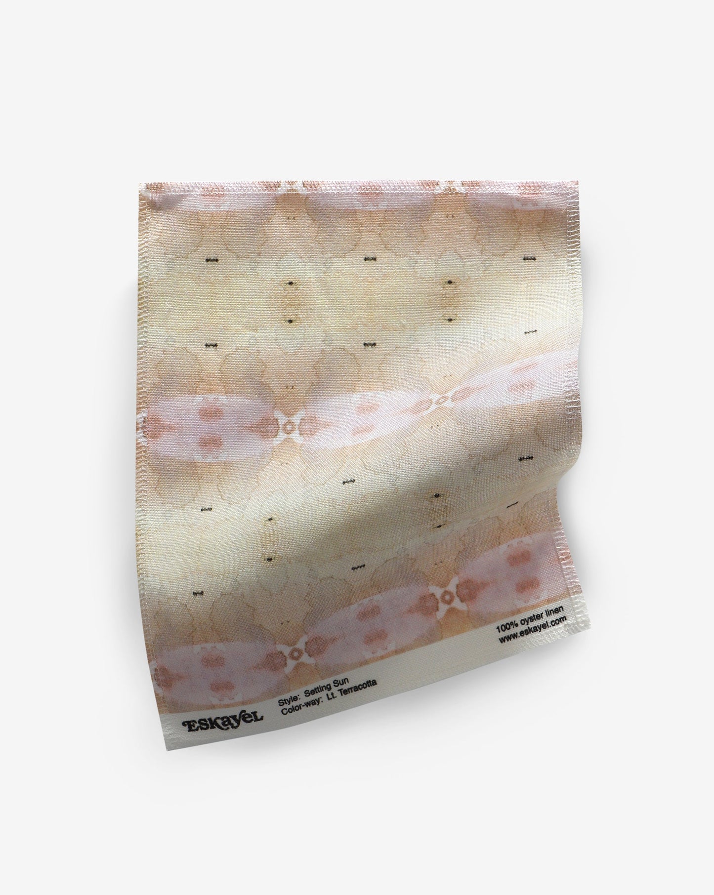 A fabric patterned with Setting Sun Fabric, reminiscent of the light terracotta and beige pattern in the American West