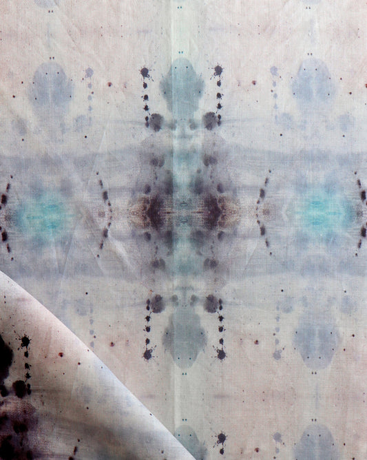A close up of Shakya Fabric Dusk with a blue and white pattern