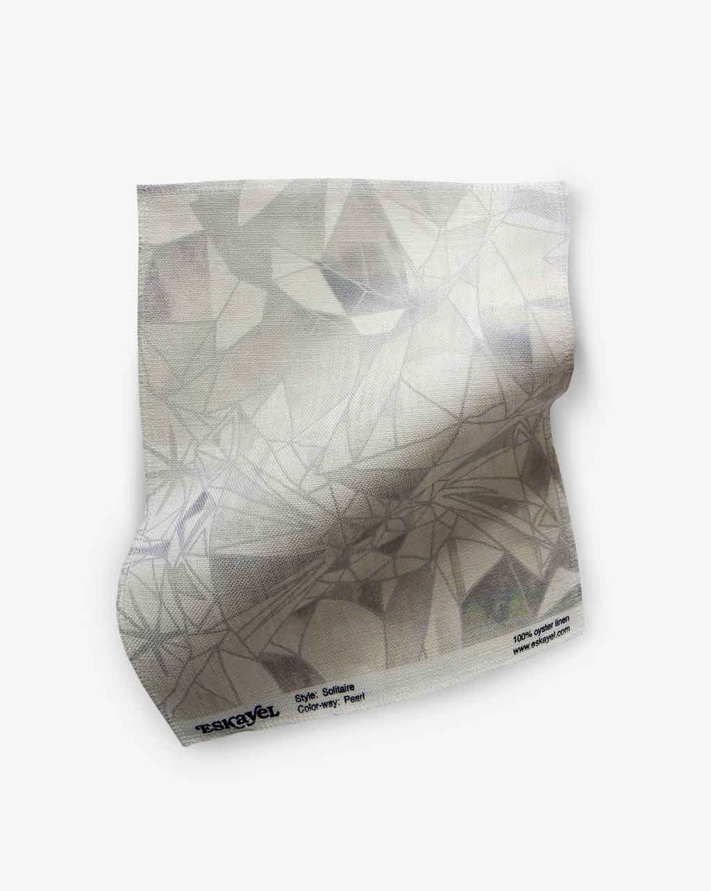A geometric patterned Solitaire Fabric Sample||Pearl of paper.