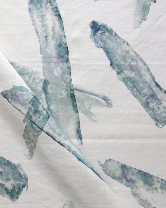 A Splinter Fabric with a splinter pattern and blue and green leaves on it