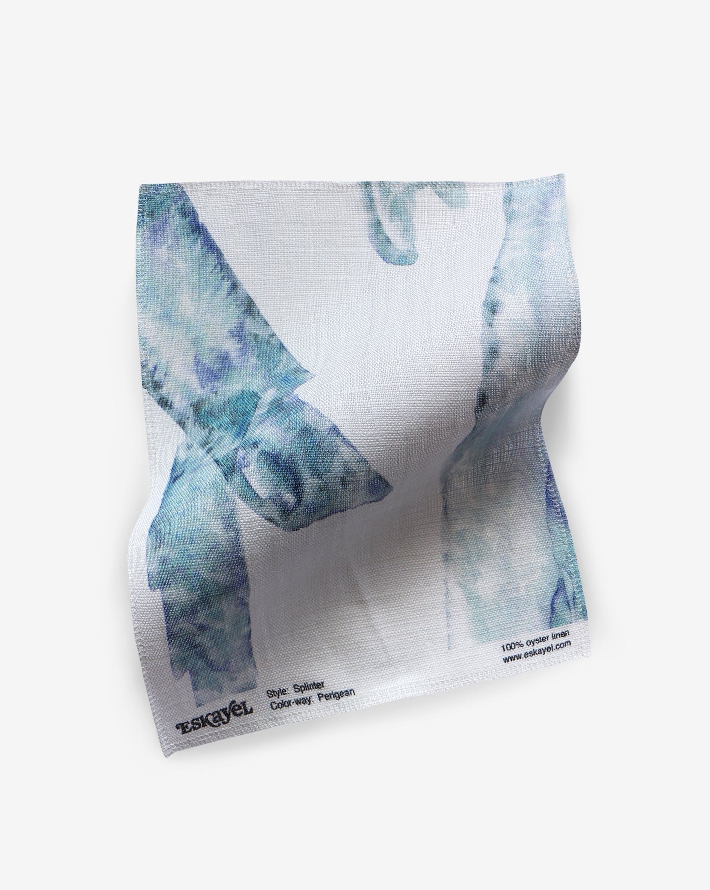 A fabric with a blue and white design in a Splinter Fabric Perigean pattern