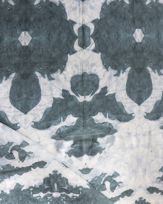 A luxury fabric from The Dance Fabric in ocean colorway with a pattern on it