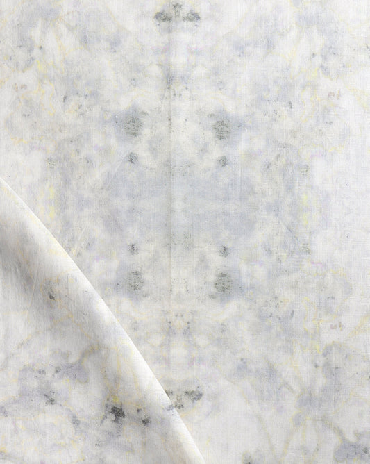 A close up image of a luxurious white marble fabric from The Drama Fabric Cloud Collection