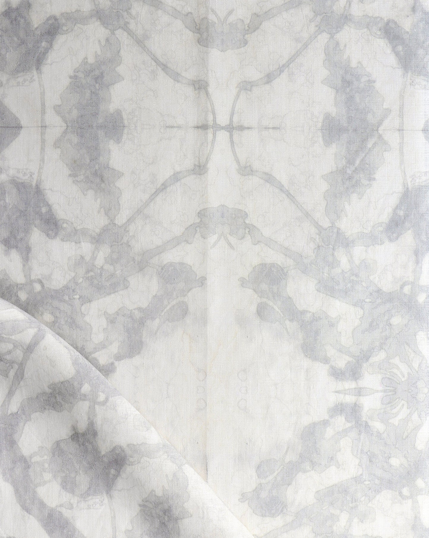 A white and gray {The Gypsy Fabric Cloud} fabric with a design on it